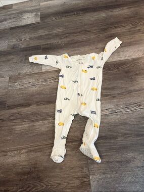 Pekkle Cream Baby One-Piece Footed Sleeper with Yellow and Blue Car Print